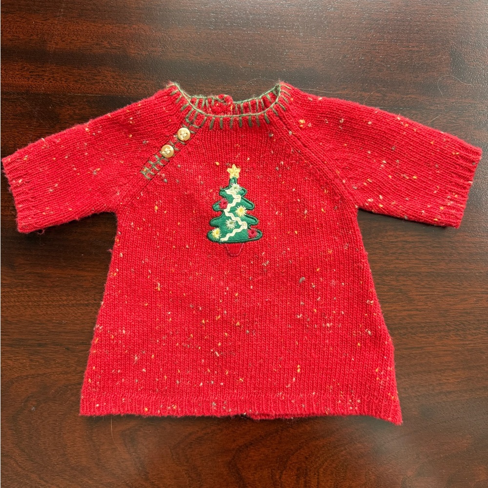 American Girl doll Christmas sweater. Great condition. Velcros in back.